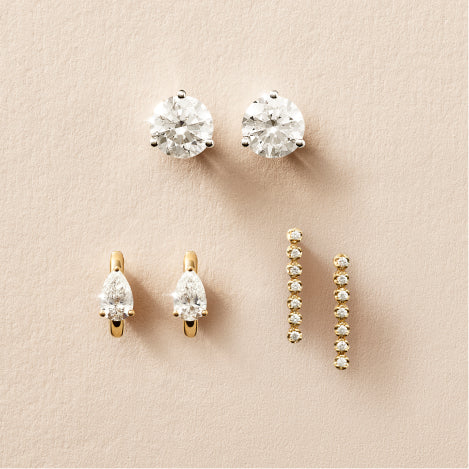 Diamond studs, pear diamond hoops and diamond drop earrings