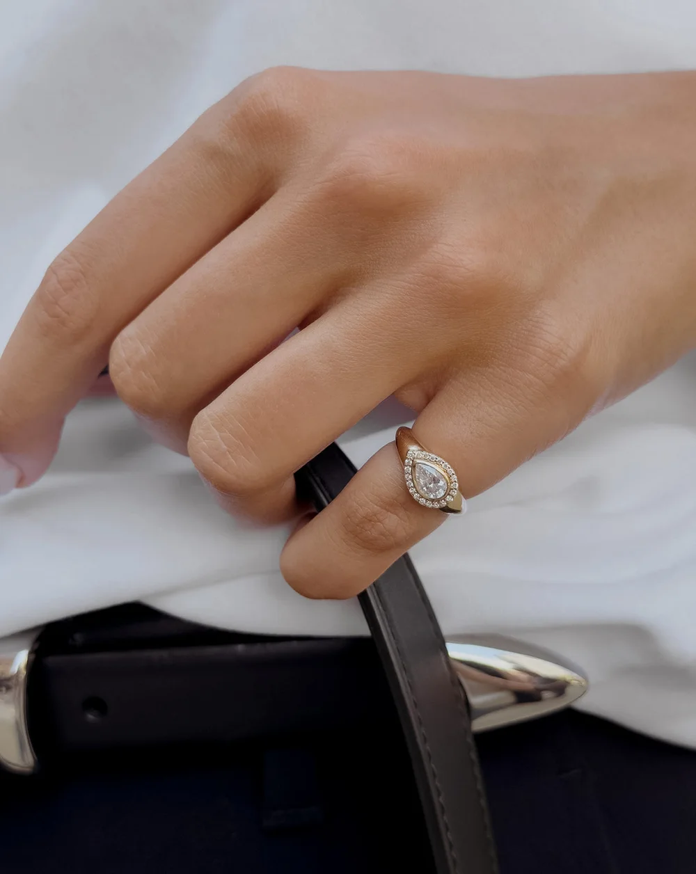 Pear Halo Diamond Ring, styled on a model